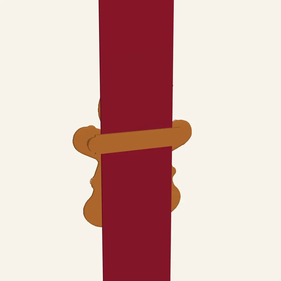 Back of a cookie showing the ribbon passing behind the hidden keeper