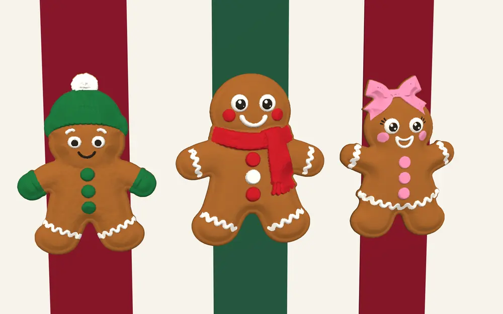Three gingerbread cookies on red and green ribbons: beanie and mittens, red scarf, and pink bow